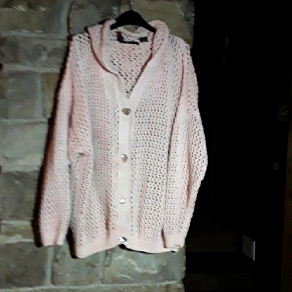 Of women's hand knit sweater in pale pink 100% cotton extra large.  Like new.